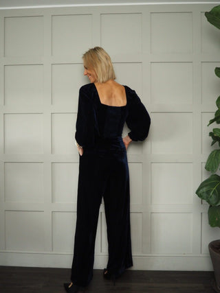 July Velvet Wide Leg Jumpsuit with Deep, Square Neckline Front &amp; Back, Long Sleeve with Frilly Detail by Frnch - Navy Blue