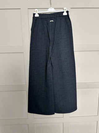 Bambino Herringbone Wide Leg Stretch Trousers by Humility- Charcoal Grey