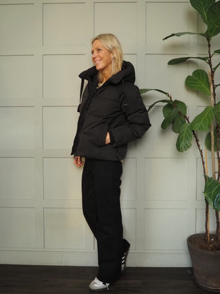 Pavinaria Short, Padded, Hooded Coat with Water Repellant Finish by Moss Copenhagen - Black