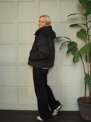 Pavinaria Short, Padded, Hooded Coat with Water Repellant Finish by Moss Copenhagen - Black