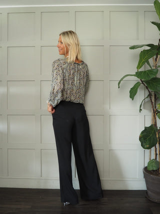 Nichelle Wide Leg Trousers with Side Zip and Button Fastening by Moss Copenhagen - Black